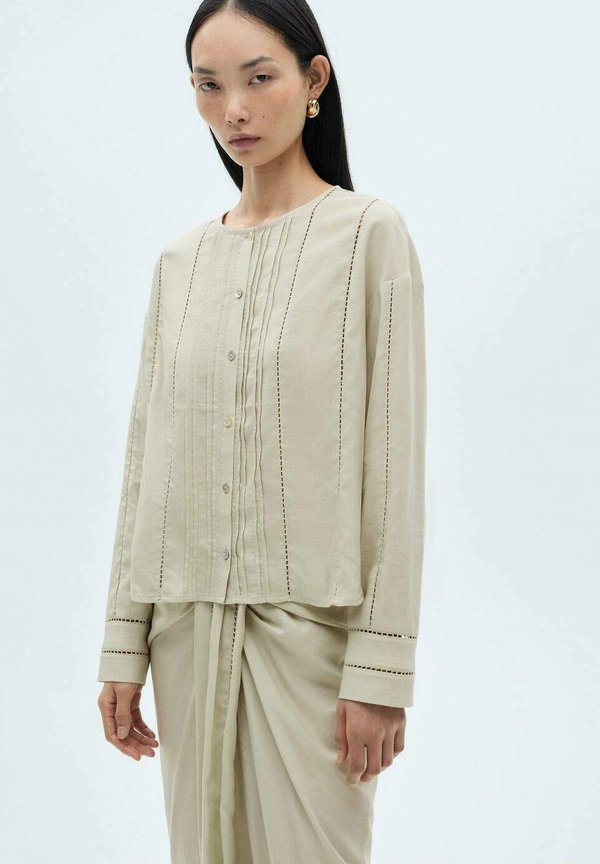 

Блузка на пуговицах Mango, зеленый