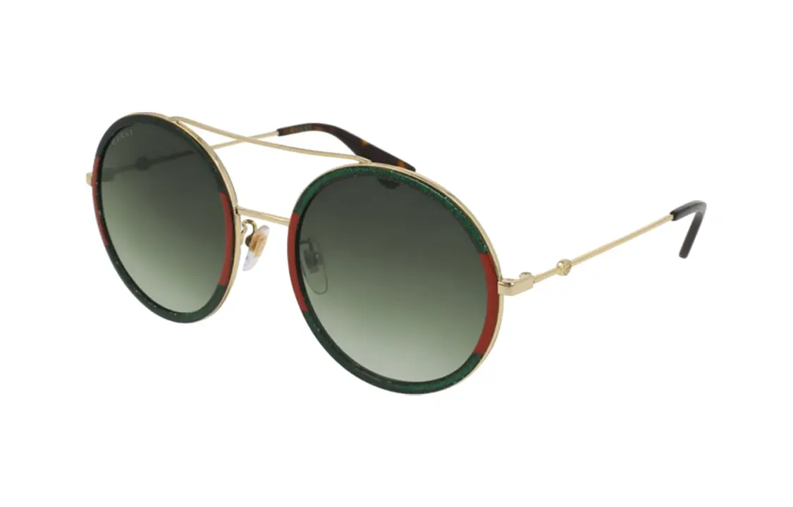 

Солнцезащитные очки GUCCI женские золотистые асимметричной формы