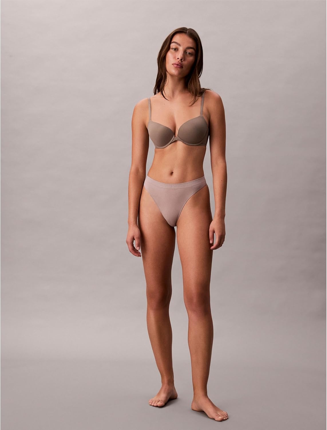 Женские бесшовные трусики-стринги Calvin Klein Bonded Flex, комплект из 3 шт., средняя посадка, Black/Mink/Beet Red — фото 2