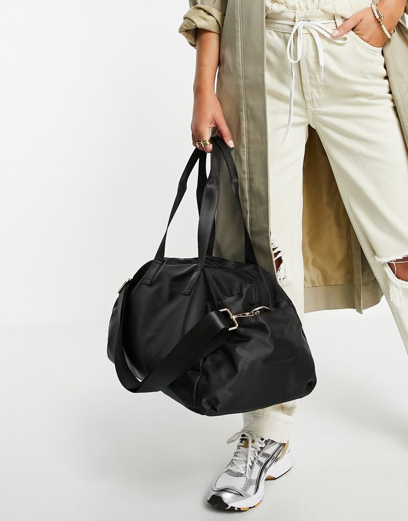

Черная дорожная сумка ASOS DESIGN