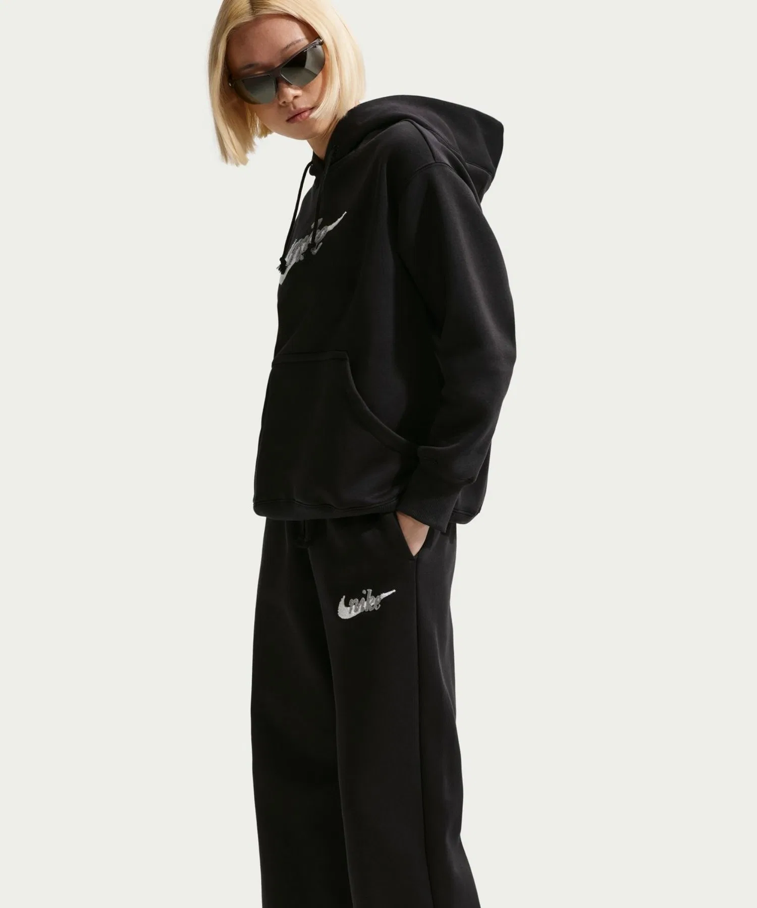 Женские флисовые брюки Nike NSW PHNX HR с логотипом WL — фото 3