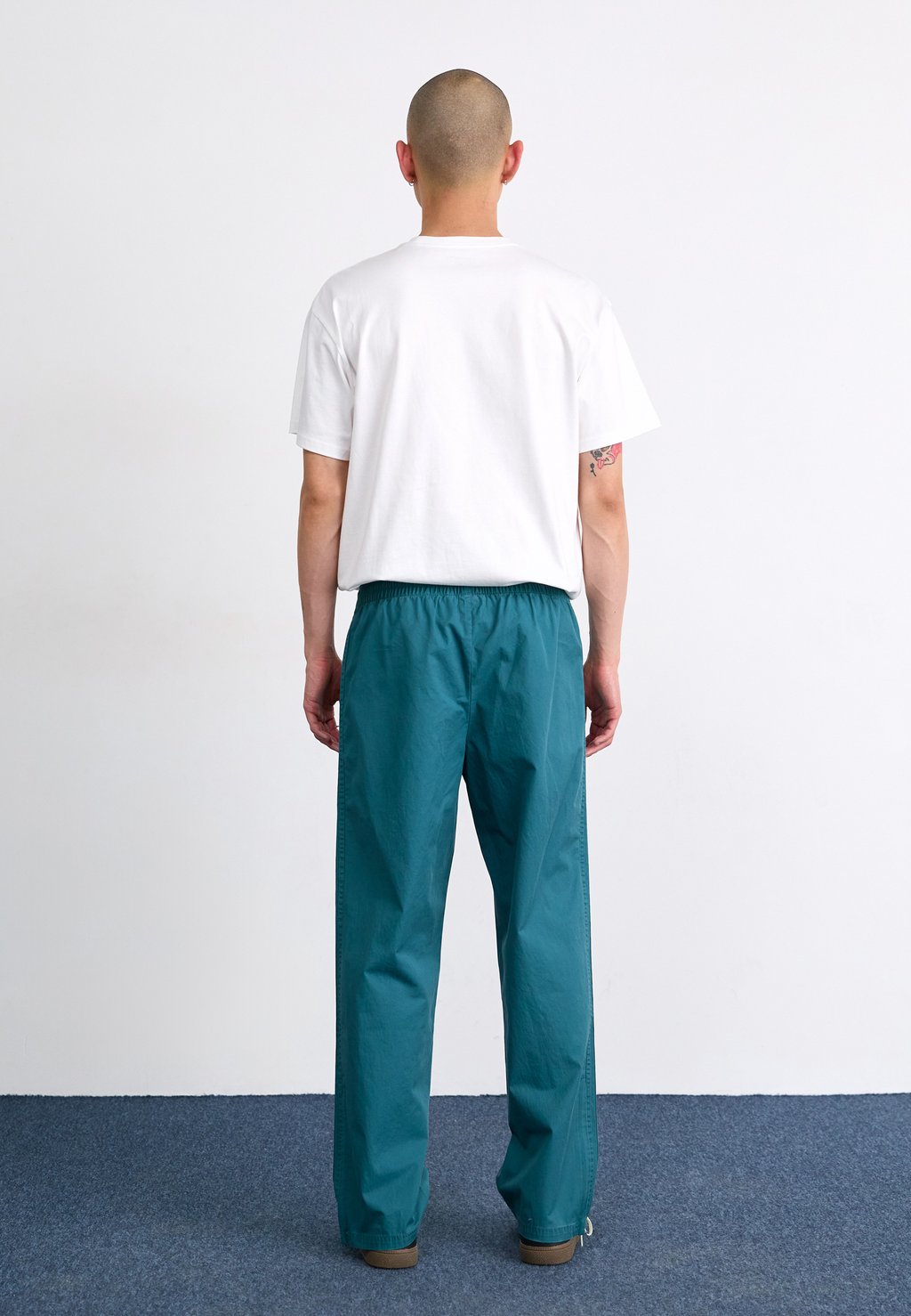 Брюки FIREBIRD PANTS Adidas Originals, темно-зеленый — фото 3