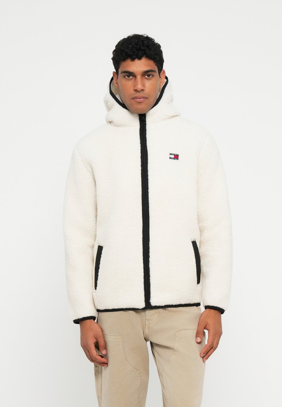 

Флисовая куртка Tommy Jeans BADGE ZIP UNISEX, Desert Sand Dune/Sand