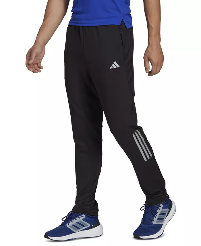 

Мужские утепленные спортивные брюки Own The Run Astro с сужением и светоотражающими элементами adidas, черный