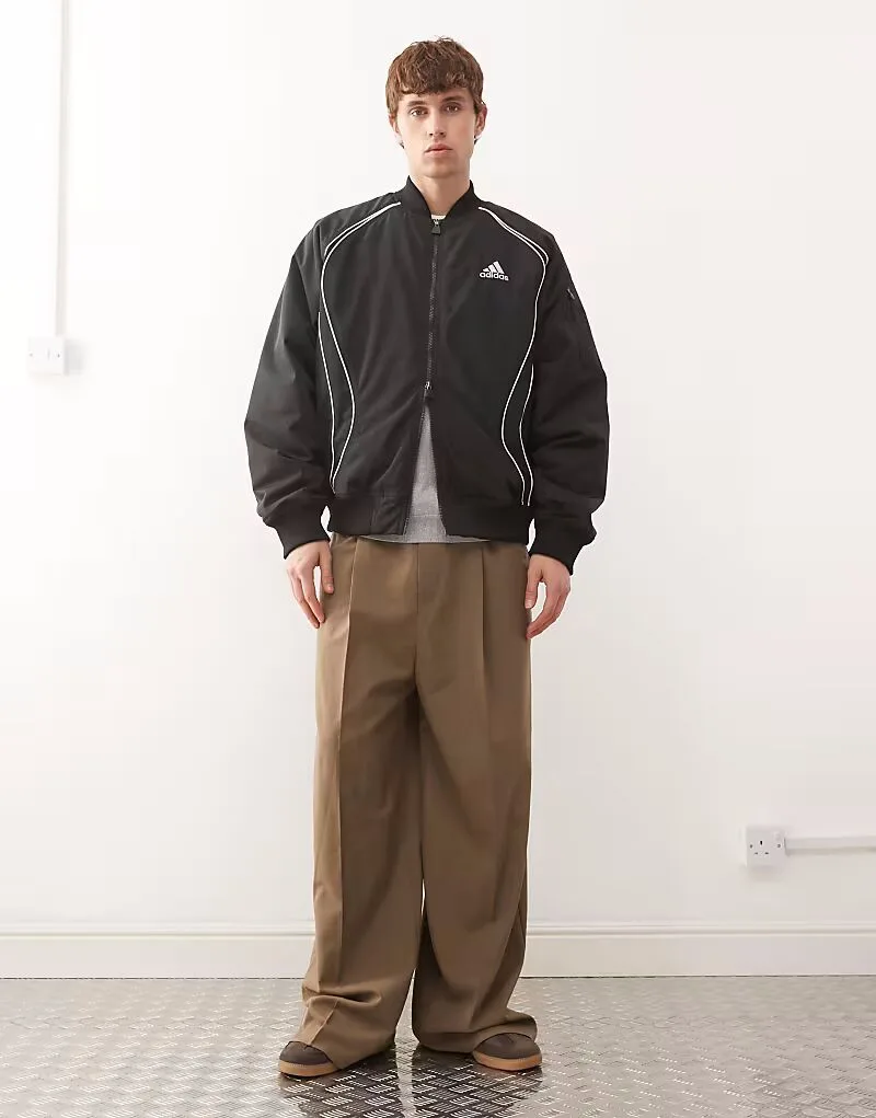 Черная дутая куртка Adidas Originals Teamgeist — фото 2