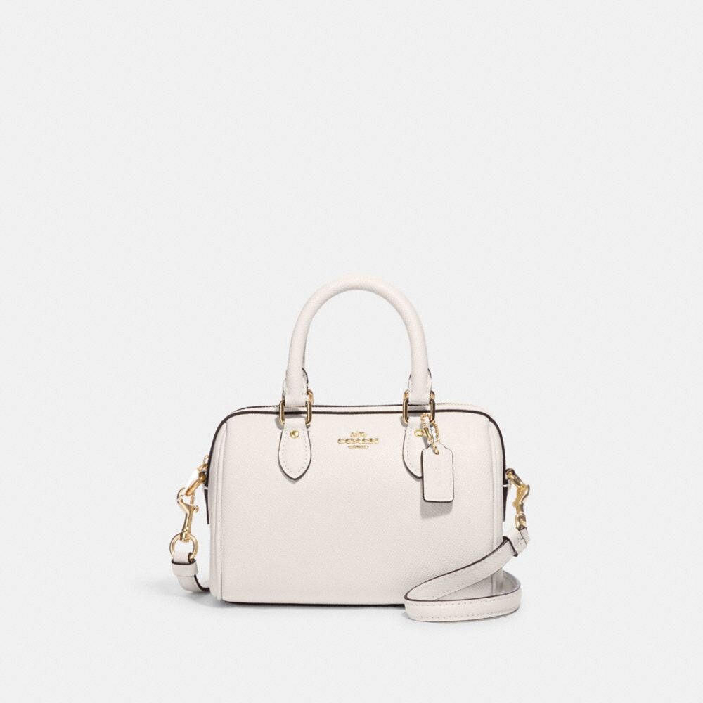 

Мини-сумка Rowan Crossbody COACH, цвет gold/chalk