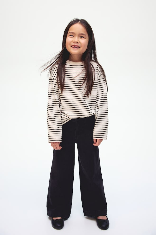 

Расклешенные брюки H&M, черный