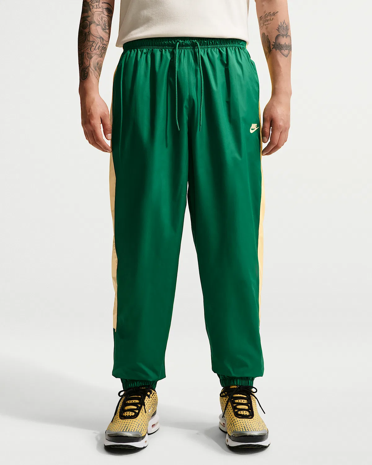 Мужские утепленные штаны Nike Windrunner, Malachite/Topaz Gold/Topaz Gold — фото 2
