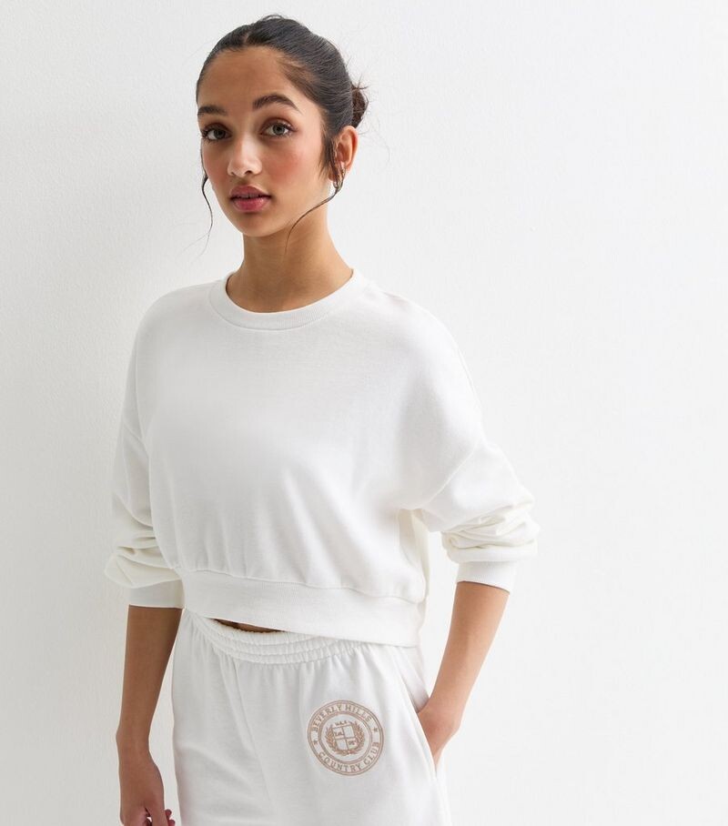 

Кремовый укороченный свитшот с круглым вырезом для девочек New Look, кремовый