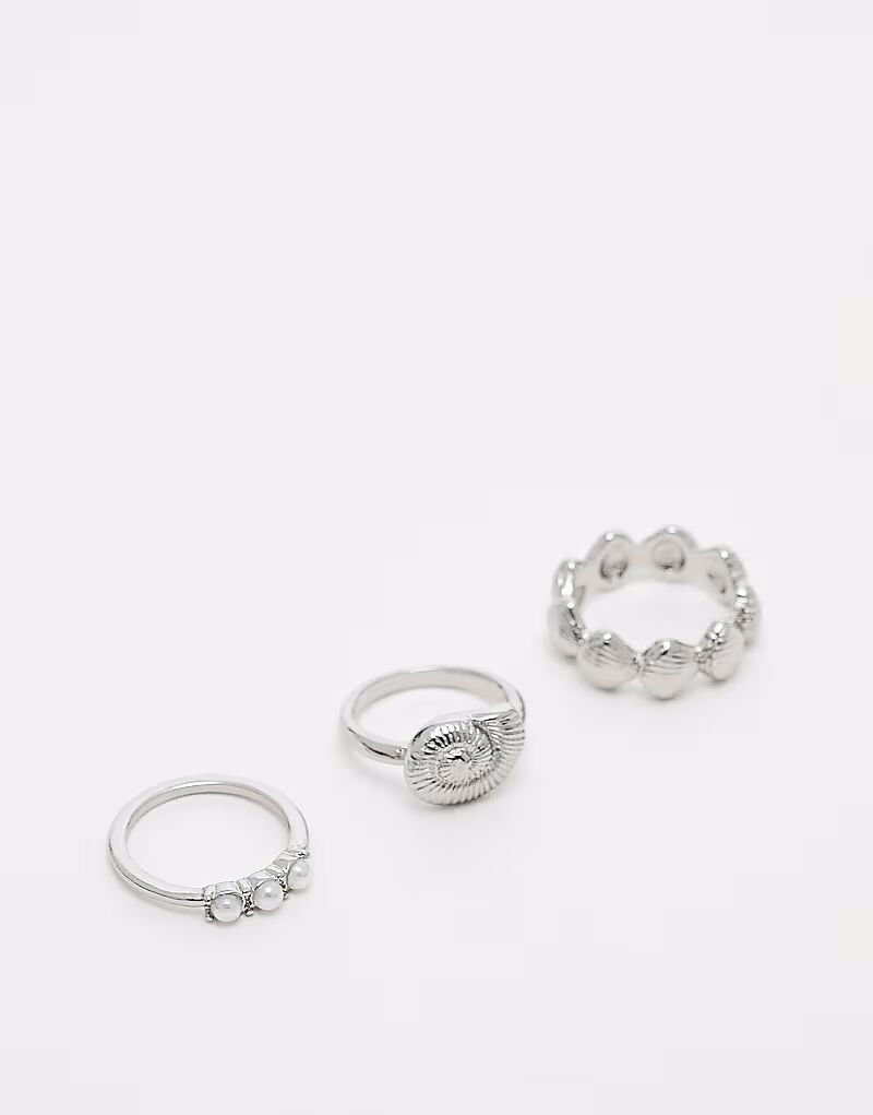 

Набор из 3 колец с ракушками и искусственным жемчугом в серебристом тоне Asos Design