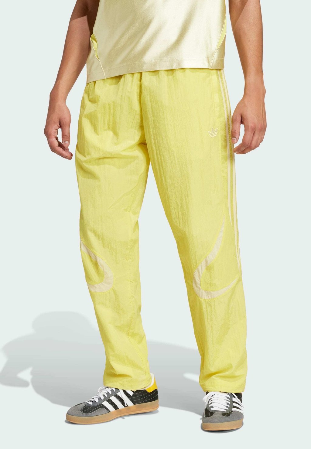 

Спортивные штаны ADICOLOR 2000S WOVEN TRACK LOOSE Adidas Originals, желтый