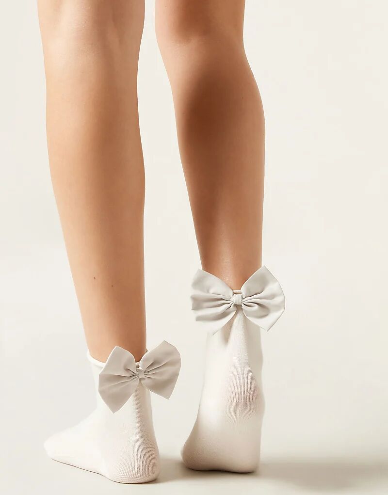 

Носки Calzedonia Bow в цвете «ледяной синий»