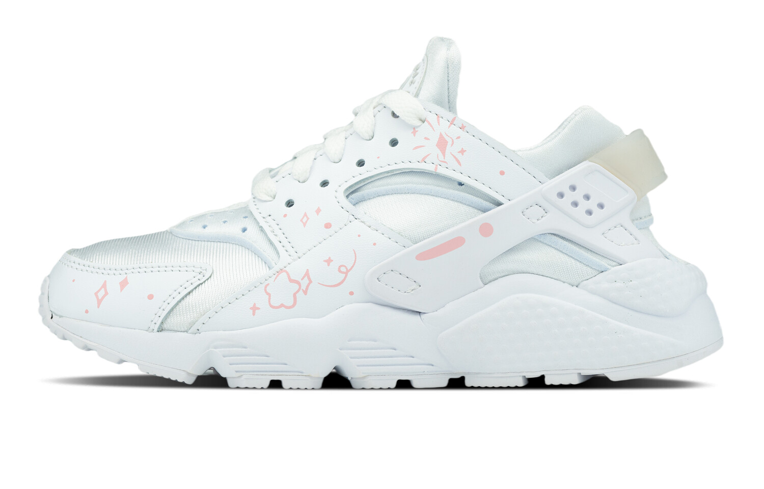 

Кроссовки Air Huarache женские с низким верхом розового цвета Nike
