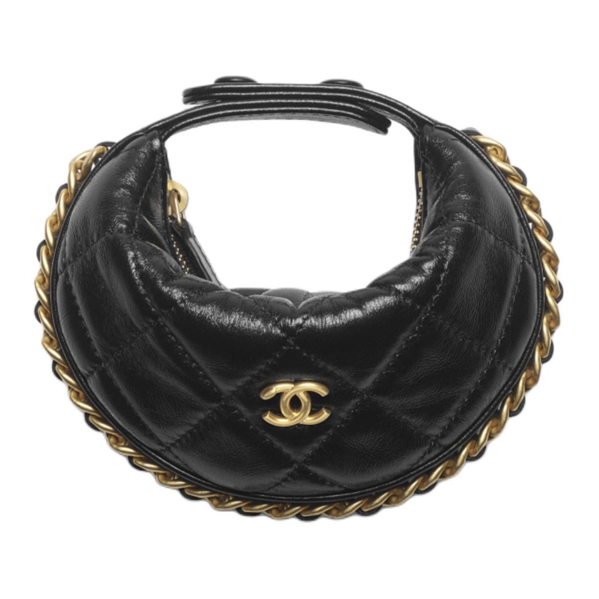 

CHANEL Блестящая кожаная сумка из барашка с морщинками