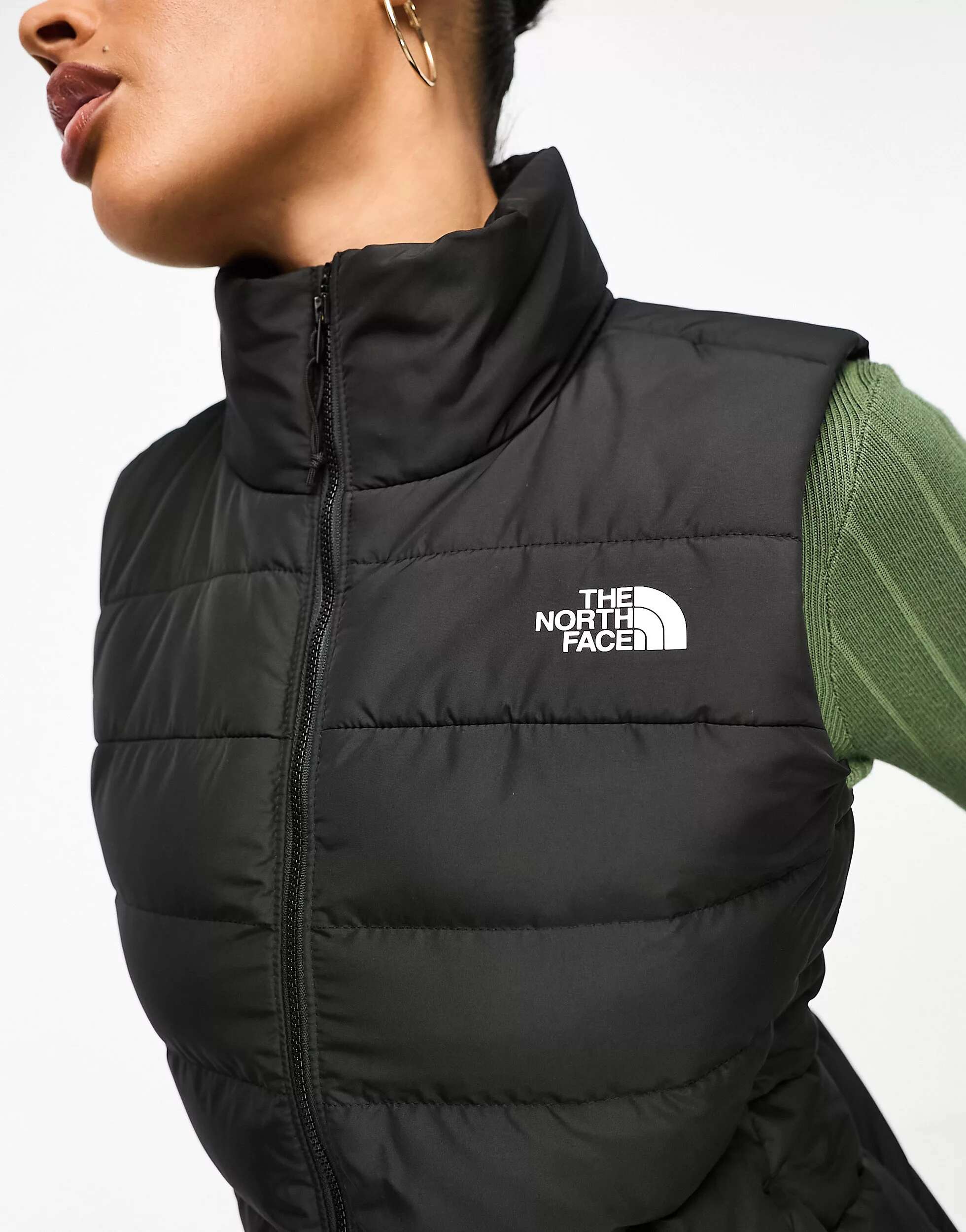 

Черный пуховый жилет The North Face Aconcagua 3