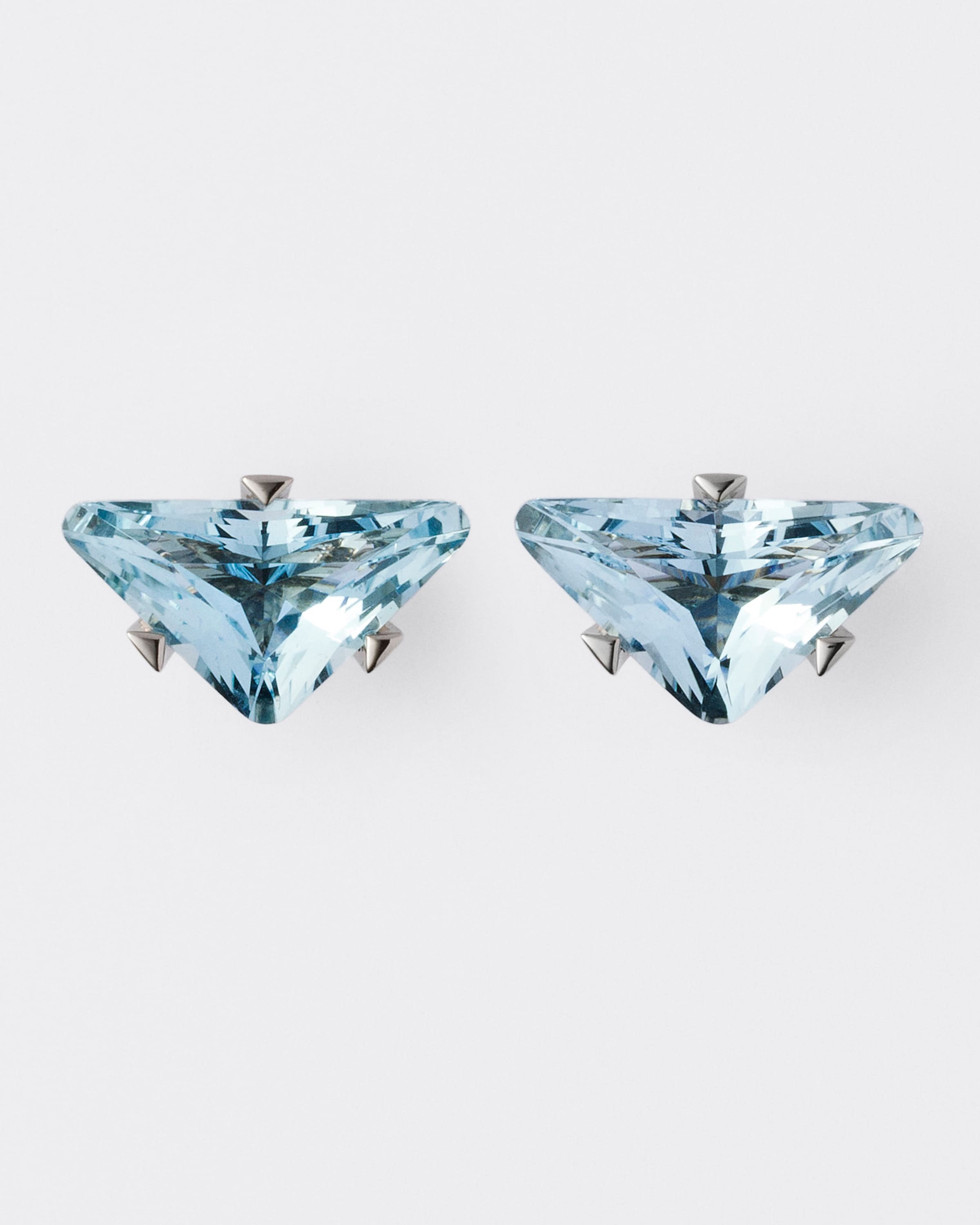 

Серьги-гвоздики Couleur Vivante - белое золото с аквамарином Prada, золото/аквамарин