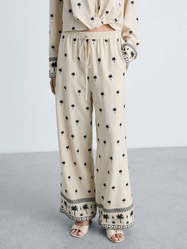 

Прямые брюки с вышитой ладонью Mango, цвет Beige/Black