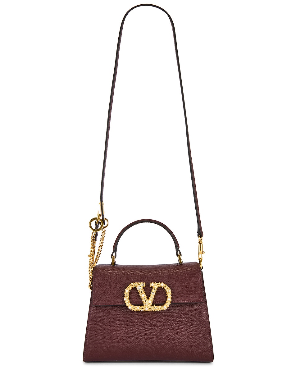 

Сумка V Sling Small с верхней ручкой Valentino Garavani, Rosewood & Cream Crystal