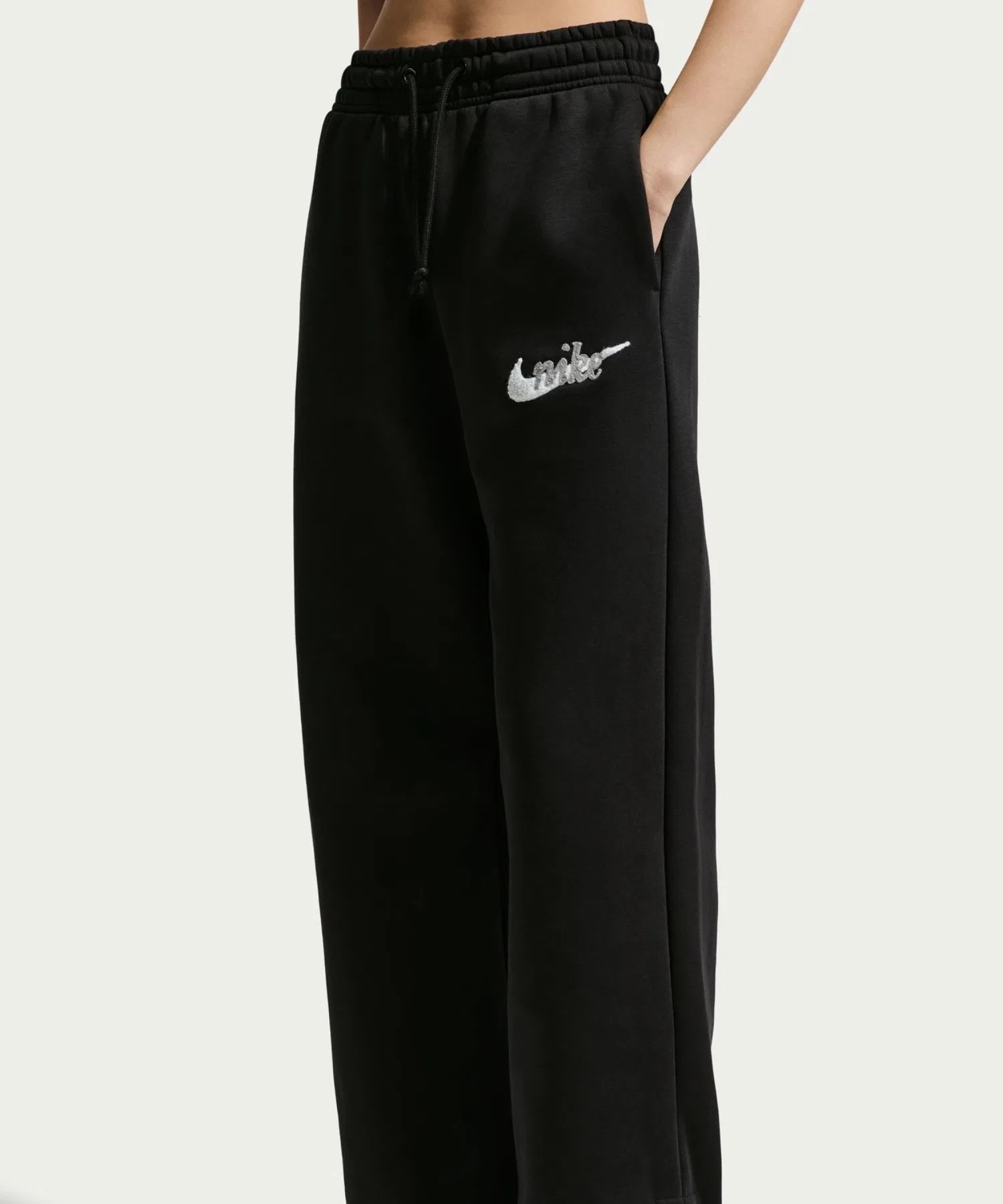Женские флисовые брюки Nike NSW PHNX HR с логотипом WL