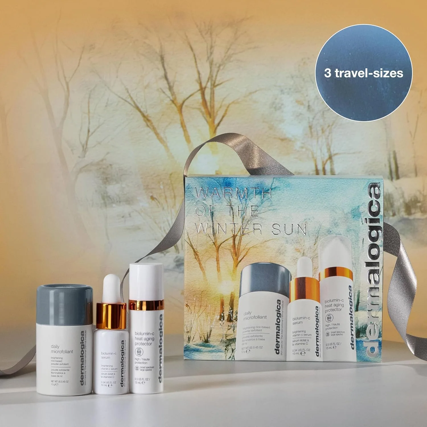 Набор для ухода за кожей Dermalogica Warmth of the Winter Sun в дорожном формате включает в себя скрабы для лица, сыворотку для лица и увлажняющий крем с SPF. — фото 2