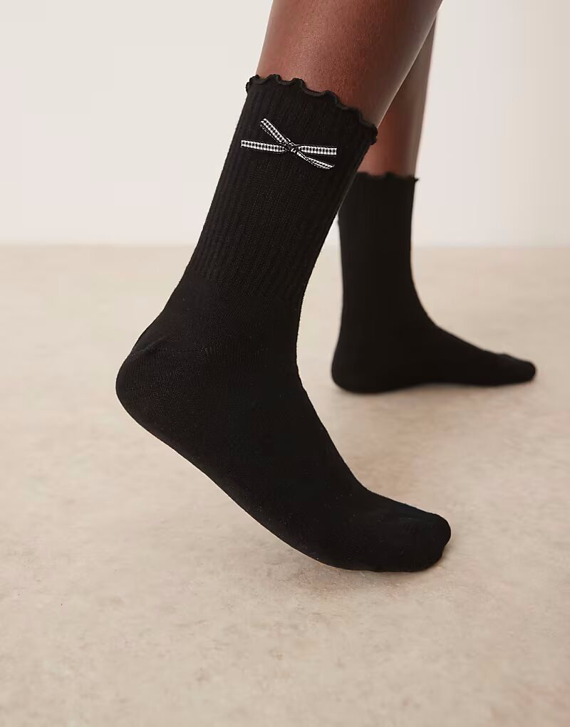 

Носки до щиколотки с оборкой и бантом в клетку ASOS DESIGN черного цвета