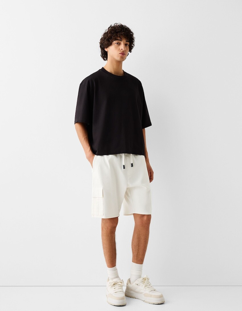 

Мягкие брюки-бермуды для бега Bershka, белый