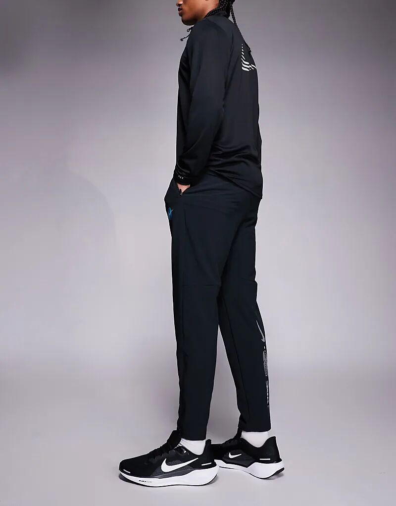 Брюки Nike Running Stride Dri-FIT из тканого материала черного цвета — фото 3