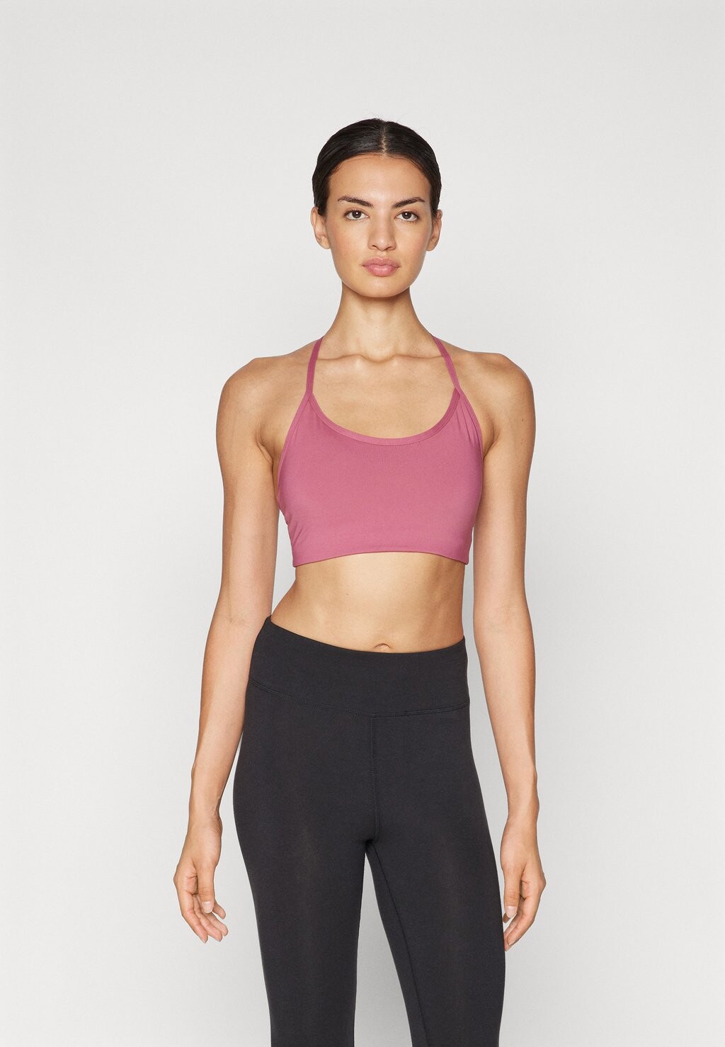 

Спортивный бюстгальтер средней поддержки SLEEK STRAPPY BRA Casall, розовый