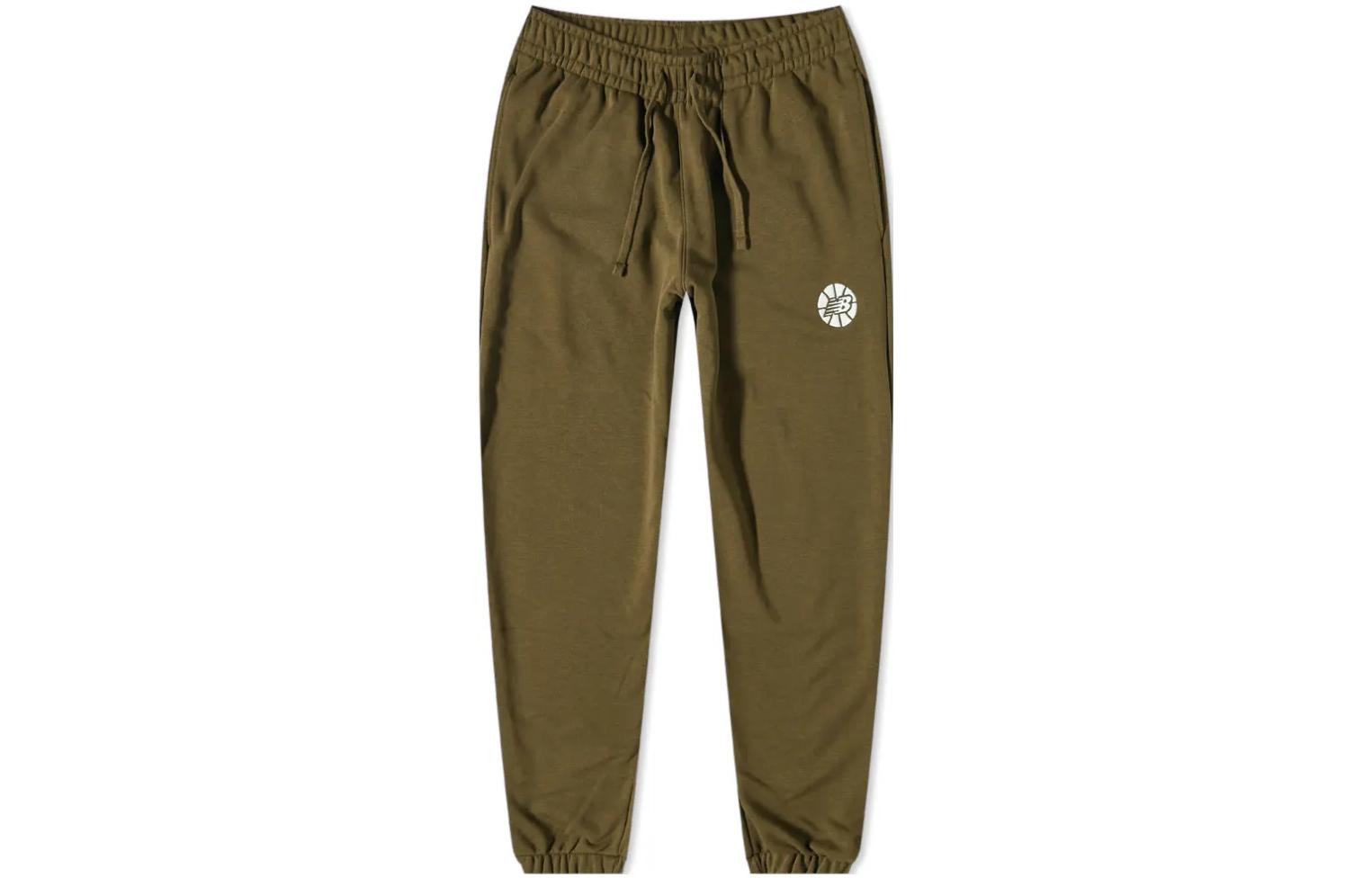 

New Balance Повседневные брюки мужские коричневые умеренные с манжетами