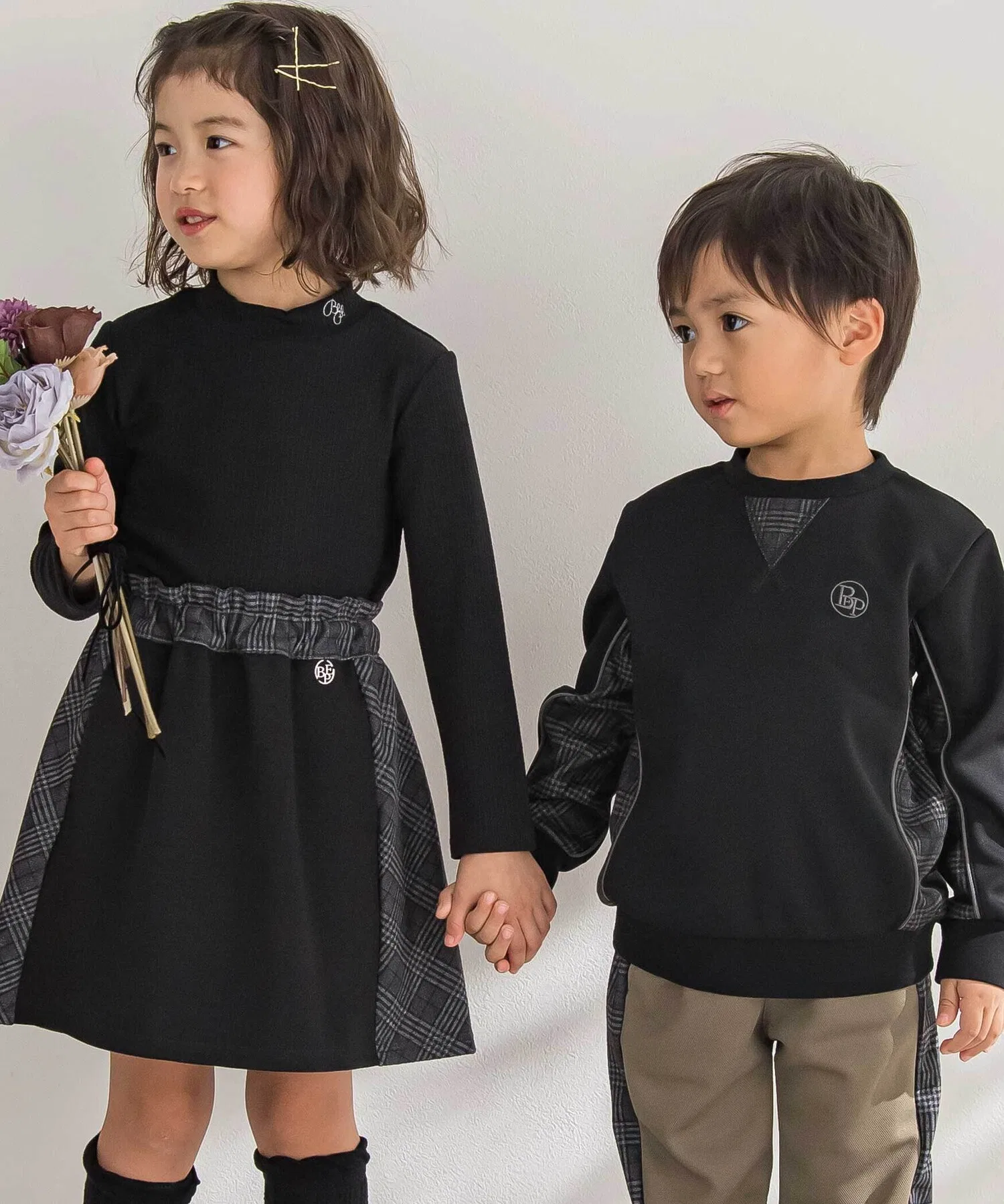 Детская юбка BeBe Petits Pois Vert в клетку с контрастной вставкой чёрная — фото 4
