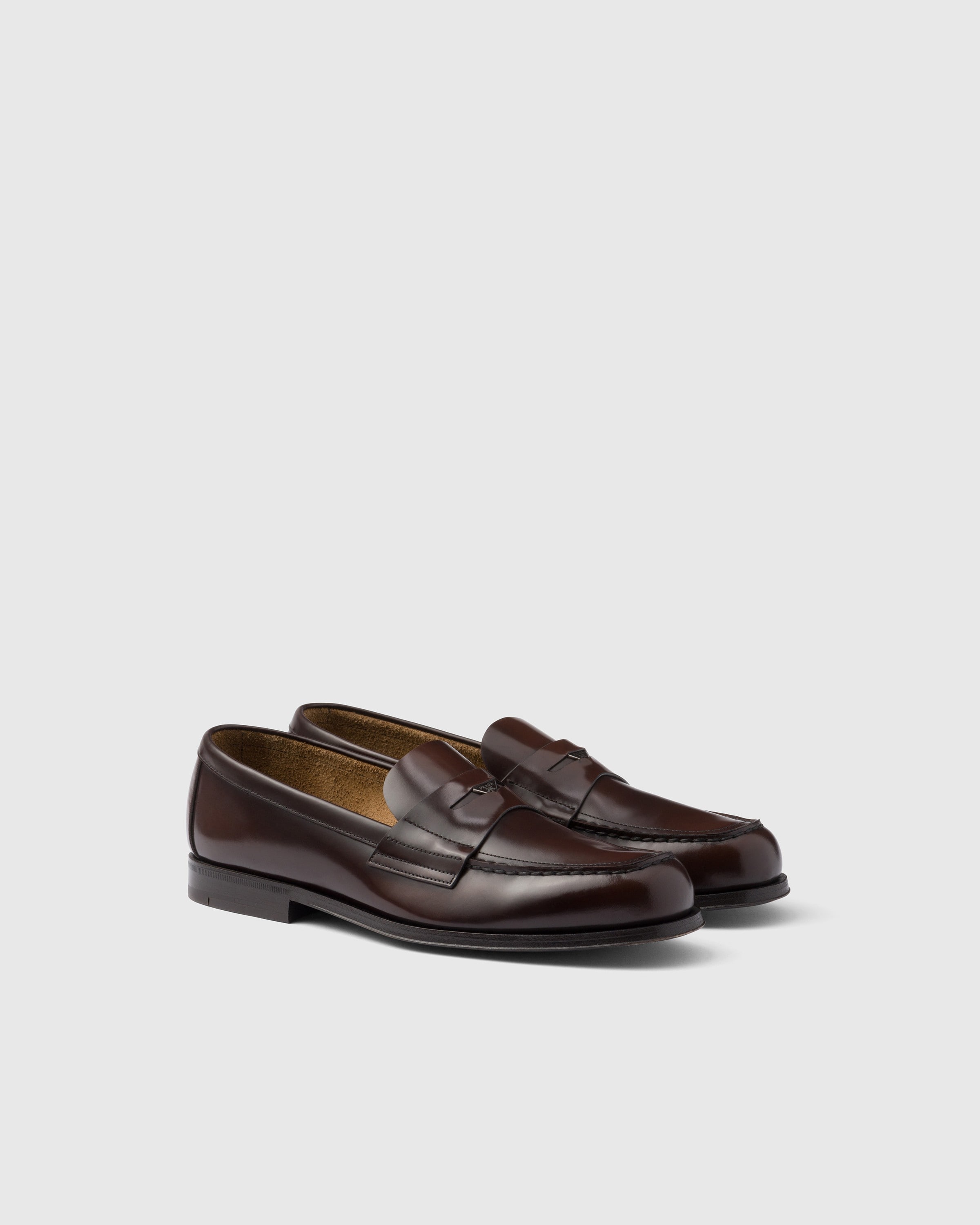 

Лоферы из полированной кожи Prada, коричневый
