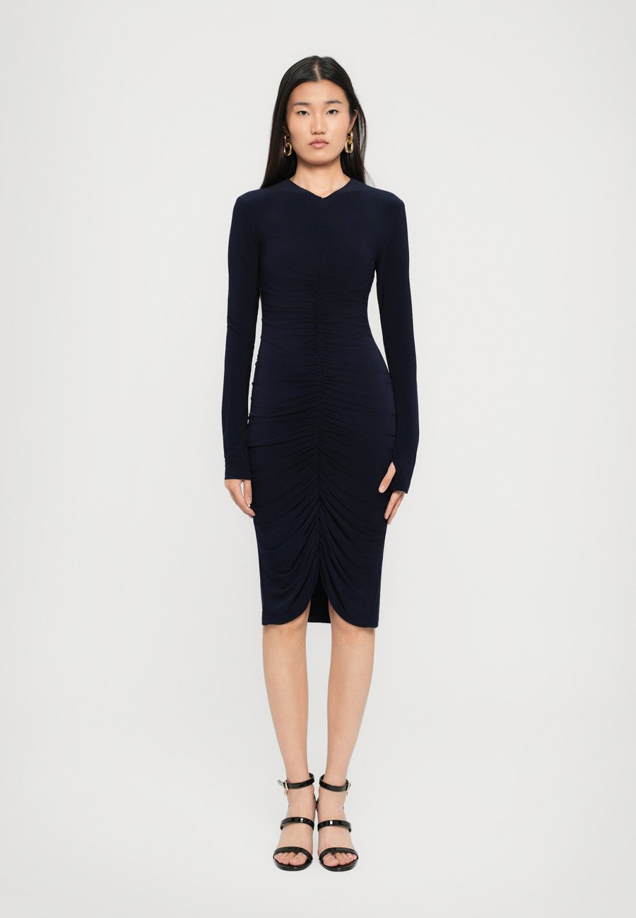 

Платье Norma Kamali LONG SLEEVE V NECK SHIRRED FRONT DRESS TO KNEE, True Navy/Dark Blue