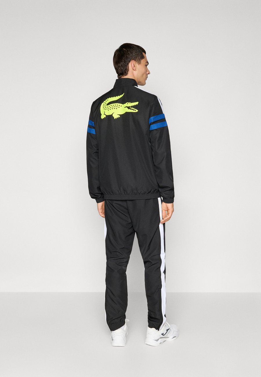 

Спортивный костюм Lacoste Sport TENNIS TRACKSUIT SET, Black/France Blue/White/Black