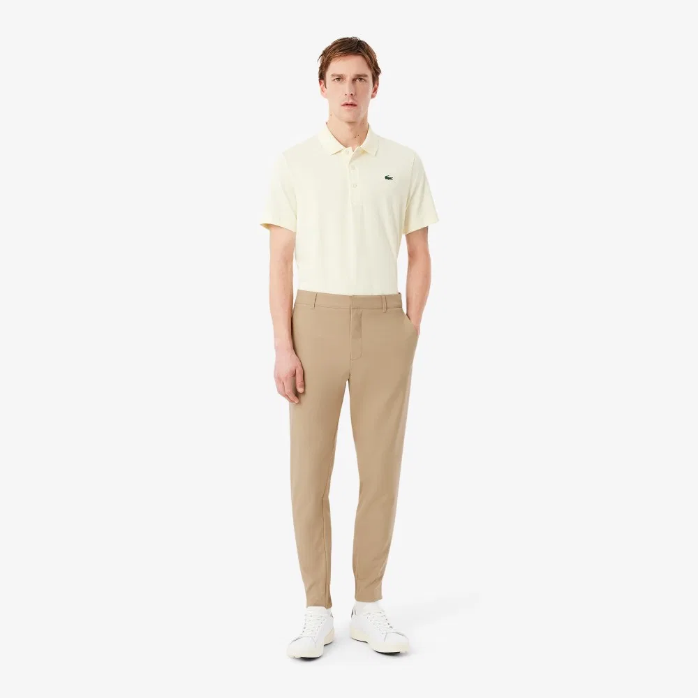 Мужские гольф-джоггеры бежевые от Lacoste