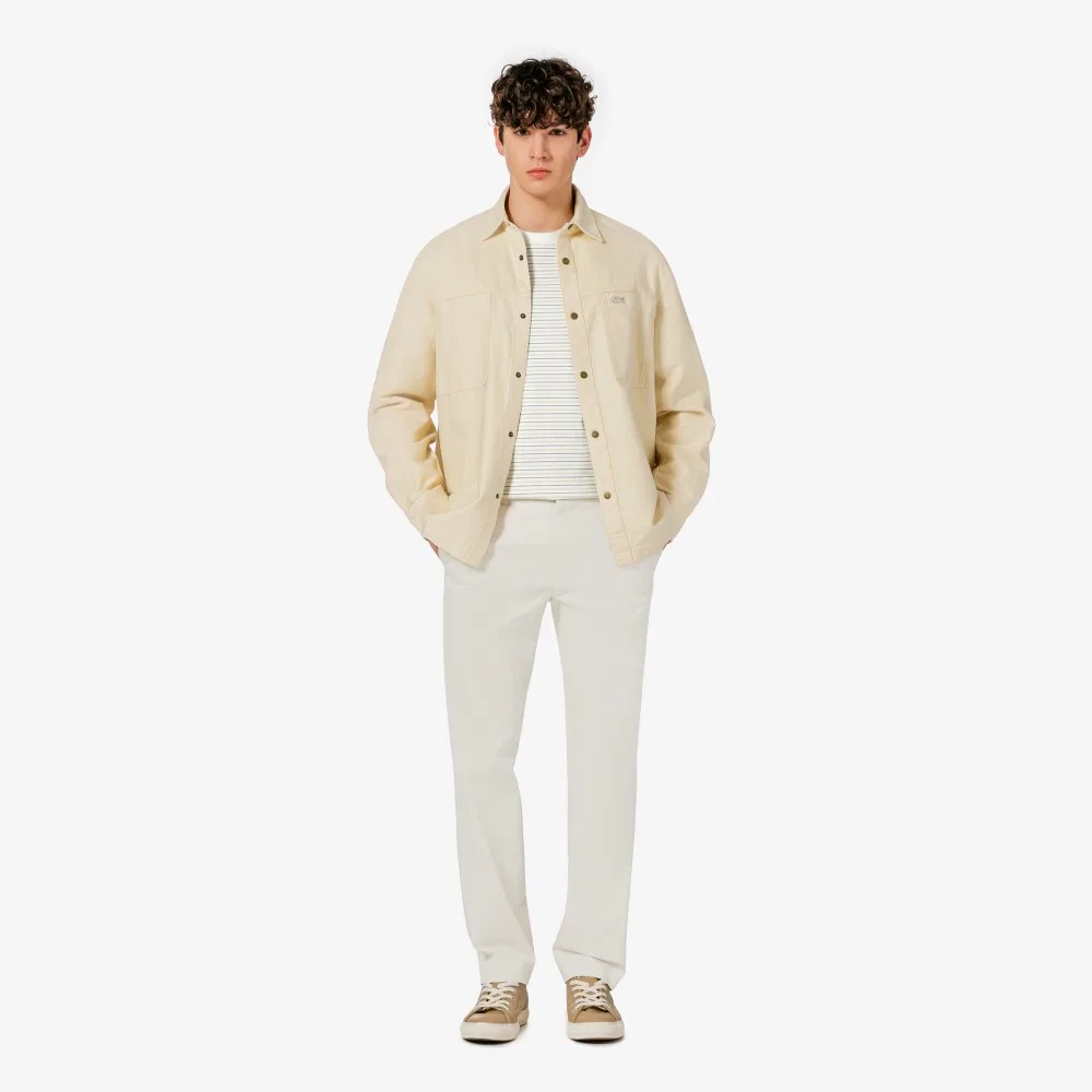 Мужские зауженные чиносы цвета айвори от Lacoste — фото 2
