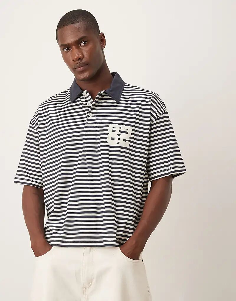 

Свободное поло свободного кроя ASOS DESIGN в черно-белую полоску