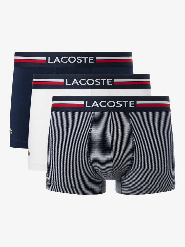 

Фирменные плавки в однотонную/полоску Lacoste, синий