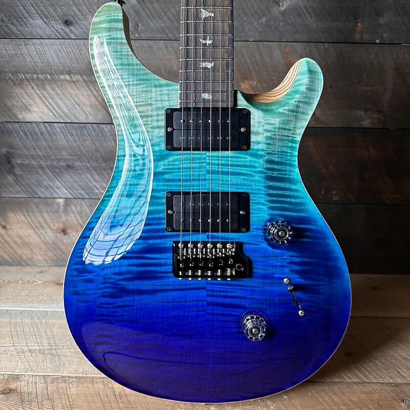 

Электрогитара PRS Custom 24 Wood Library Flame Maple 10-Top Stained Maple Neck Swamp Ash Back - Blue Fade 363699