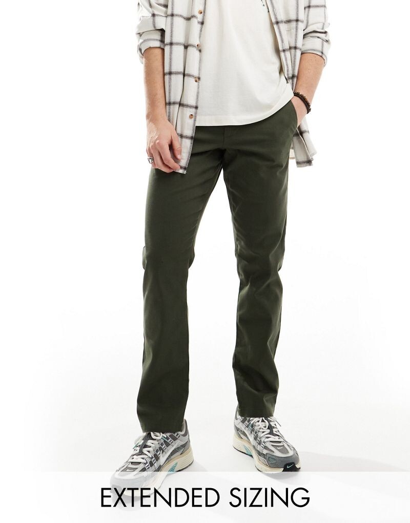 

Темно-хаки узкие брюки чиносы ASOS DESIGN