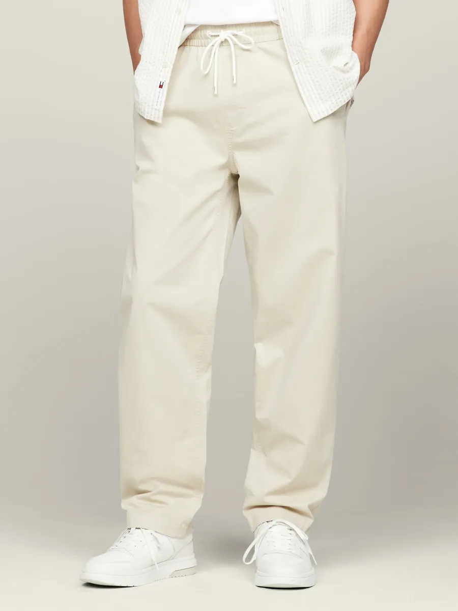 

Тканевые брюки Tommy Jeans "TJM AIDEN TAPERED CASUAL PANT", с эластичным поясом, коричневый