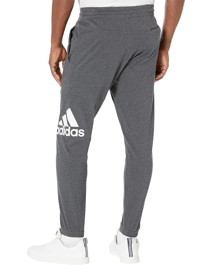 

Брюки Adidas Essentials Single Jersey Tapered Badge Of Sport Pants, цвет Dark Grey Heather