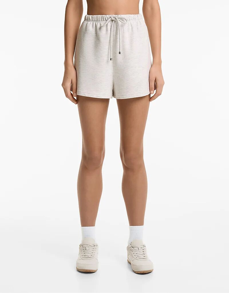 

Шорты Oysho с широкими штанинами из хлопка и модала в бледно-сером меланжевом цвете.