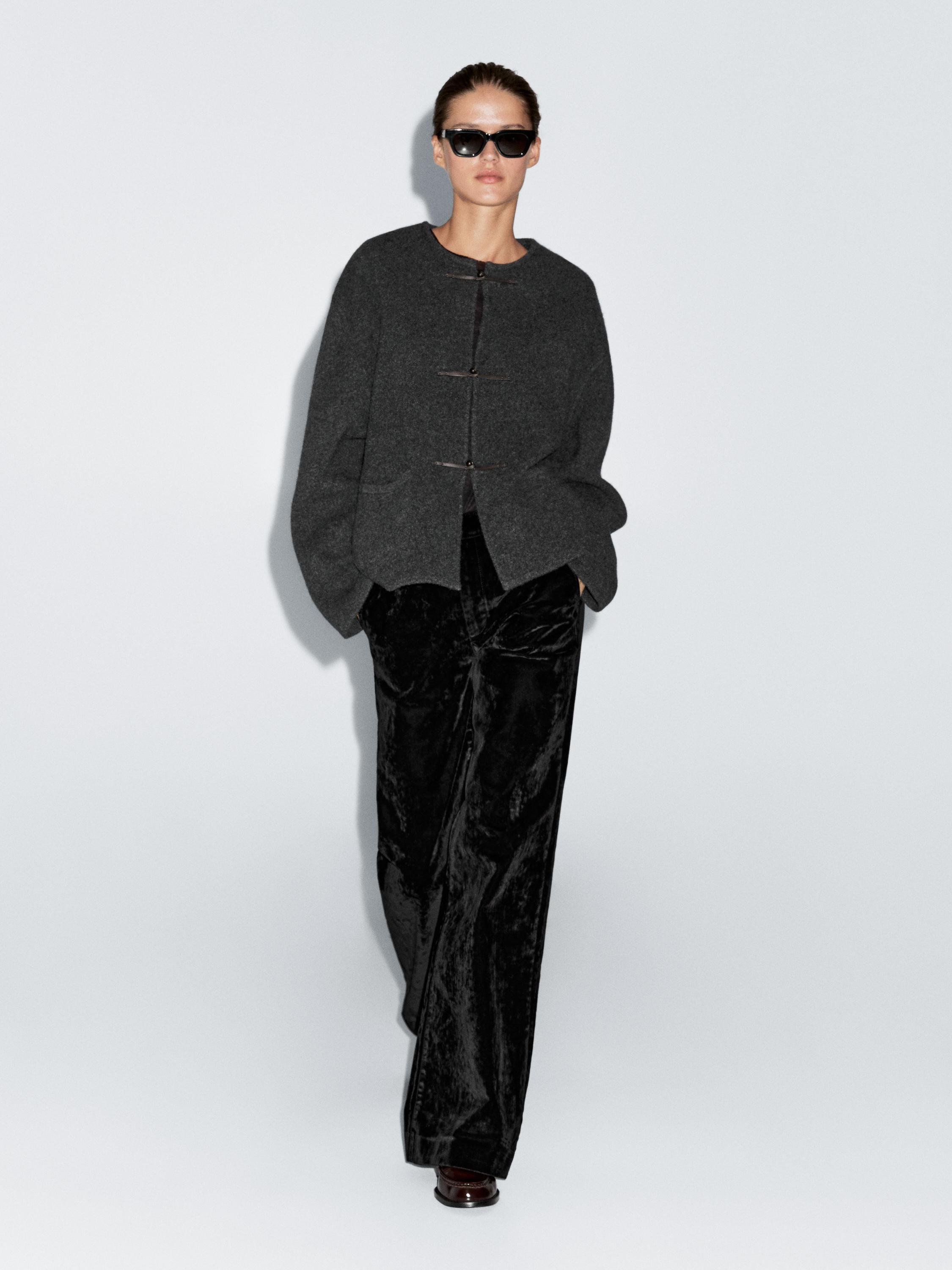 

Расклешенные джинсы с высокой талией и флокированным узором Massimo Dutti, черный