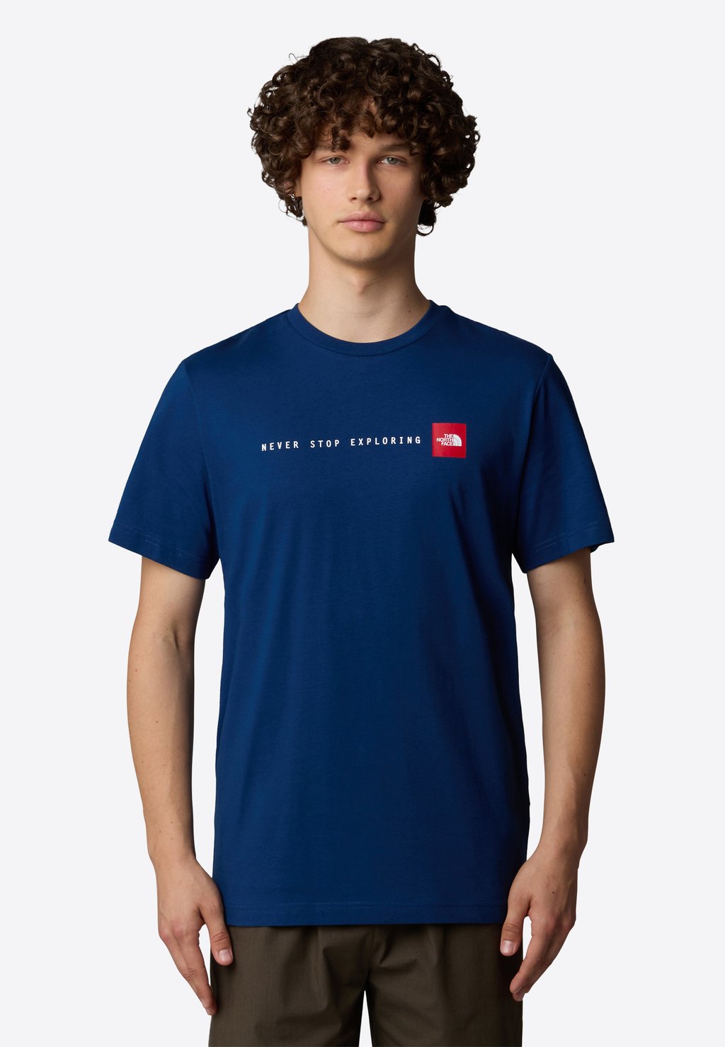 

Футболка с принтом NEVER STOP The North Face, темно-синий