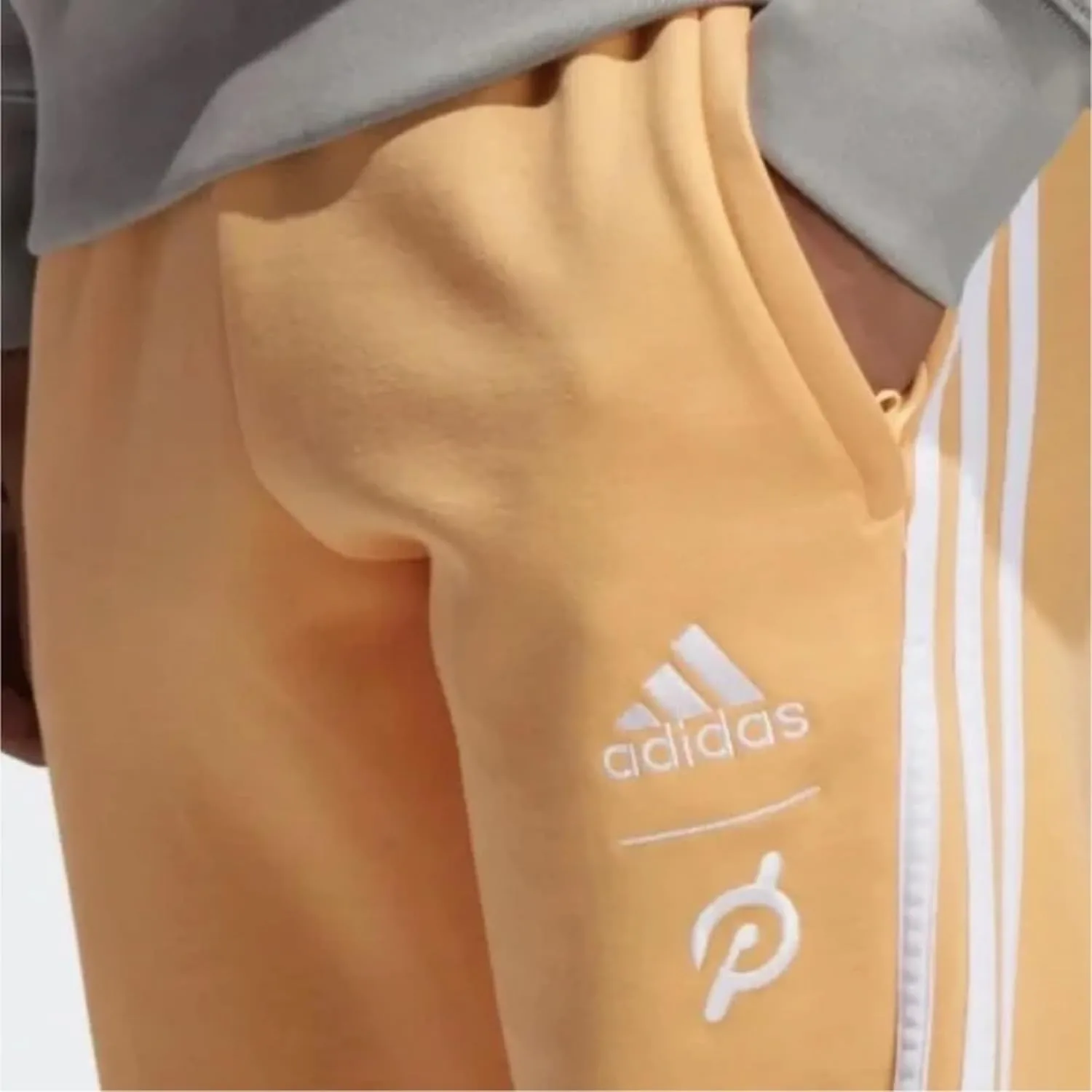 Спортивные брюки Adidas X Peloton Unisex Go Retro, цвет «кислотно-оранжевый» — фото 3