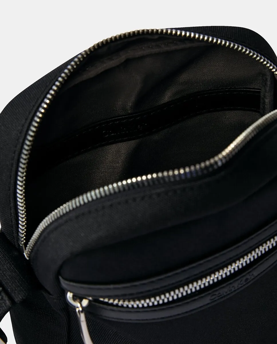 

Классическая однотонная сумка через плечо Calvin Klein, черный