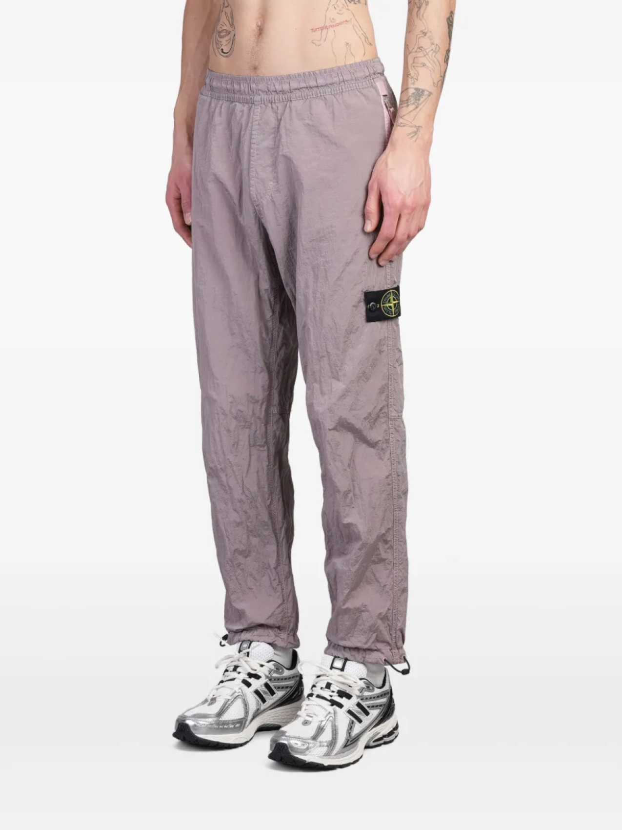 

Спортивные брюки с рисунком компаса Stone Island, розовый