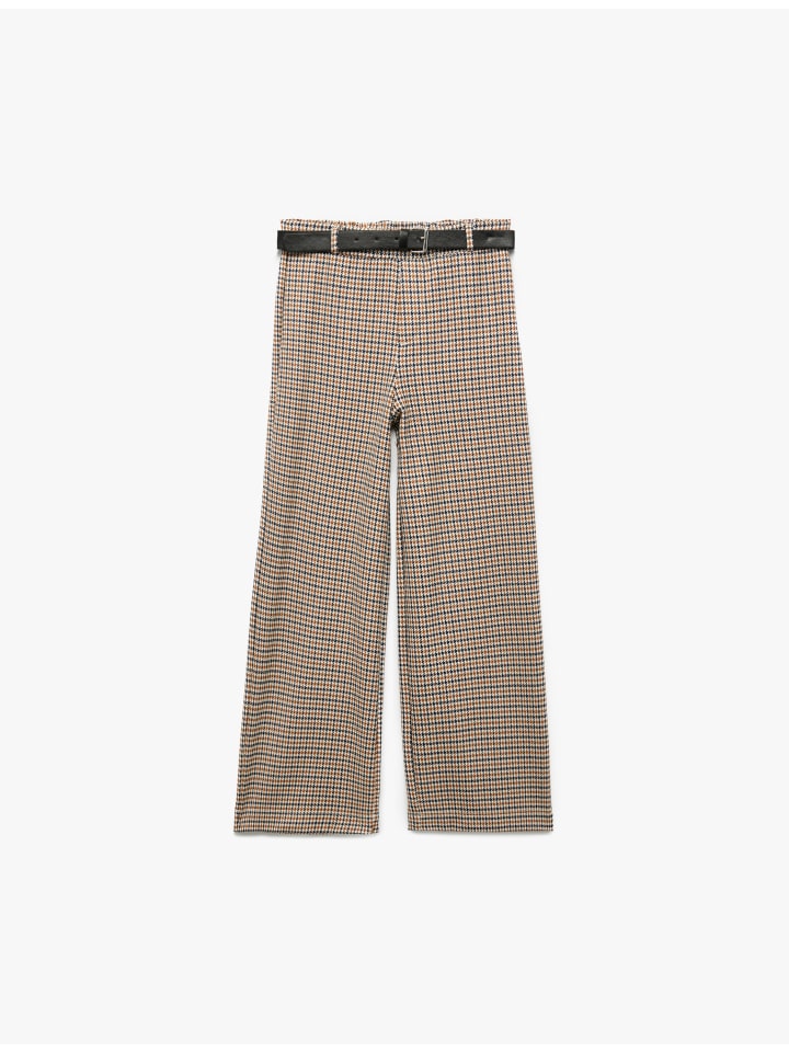 

Брюки в коричневую клетку KOTON