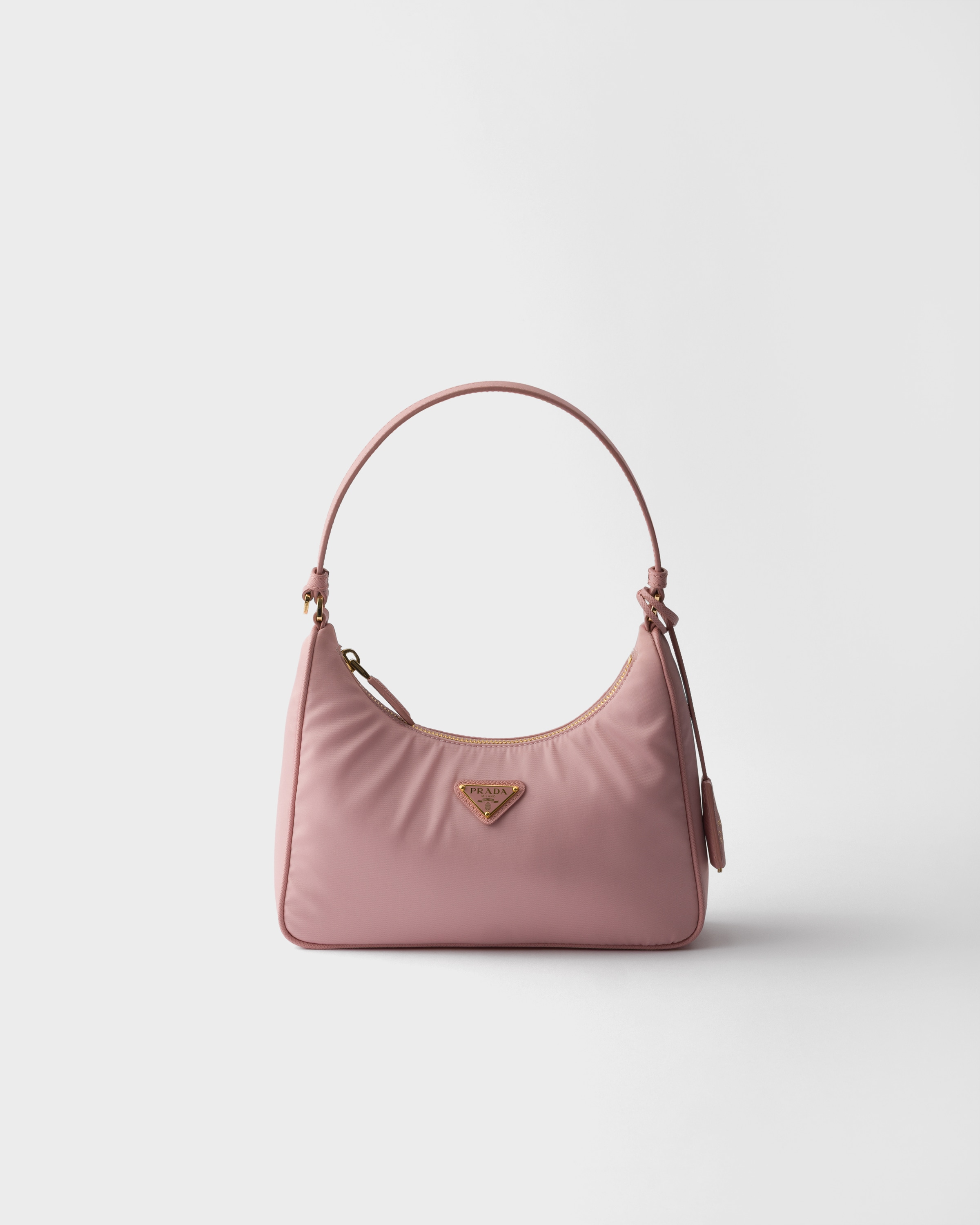 

Мини-сумка Prada Re-Edition 2005 из Re-Nylon и сафьяновой кожи, розовый