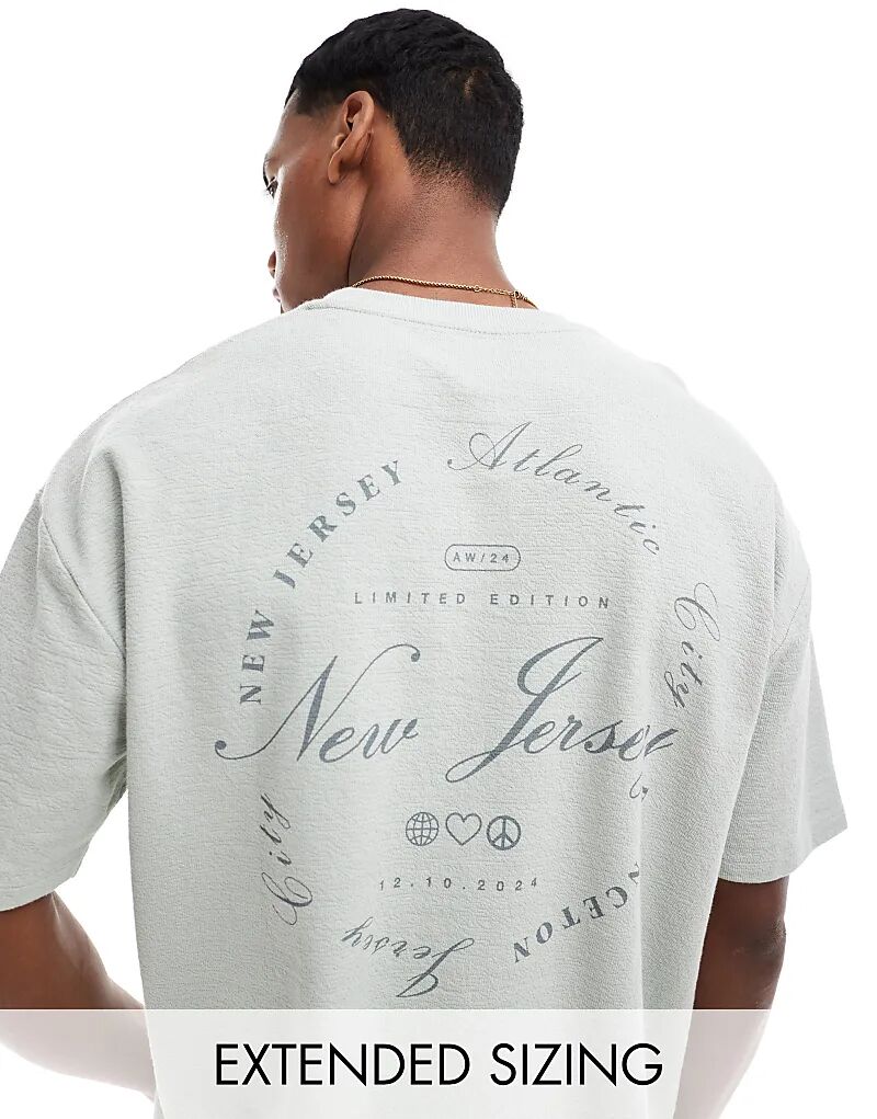 

Футболка ASOS DESIGN оверсайз с передним карманом и городским принтом сзади серого цвета